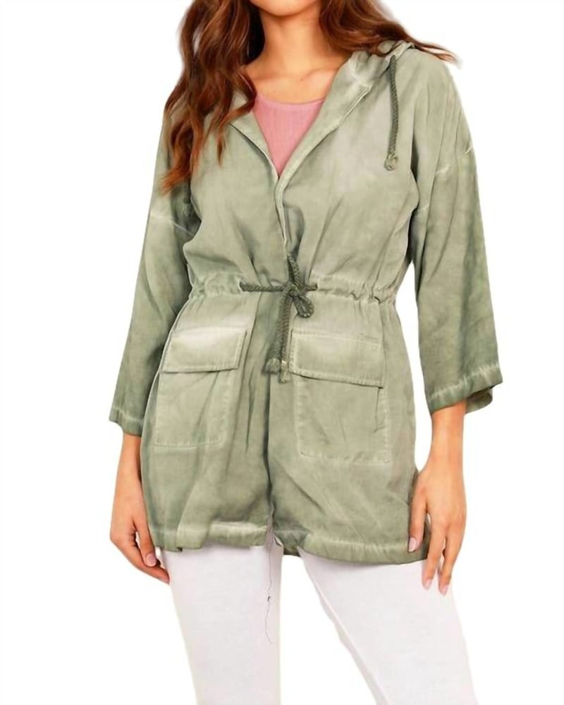 Front of a model wearing a size XL Jennifer Hooded Long Trench Coat in Olive in Olive by french kyss. | dia_product_style_image_id:326463